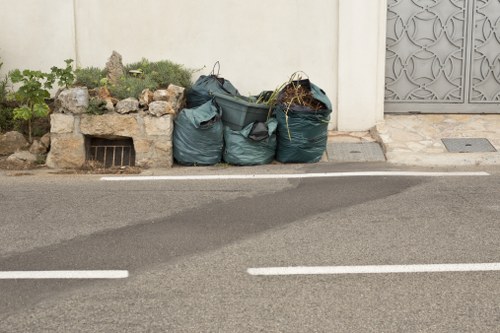 Business professionals discussing waste management in Greenhithe