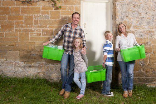 House clearance professionals sorting items in Greenhithe home